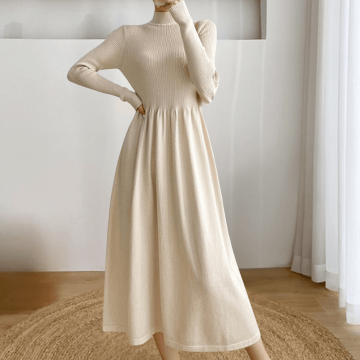 Elegant women's cozy knitted winter midi dress with long sleeves for warmth. Perfect apricot or black sweater dress.