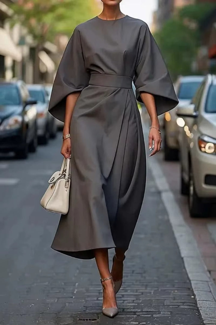 Modest women's work midi dress featuring an elegant silhouette, crew neck, and professional style.