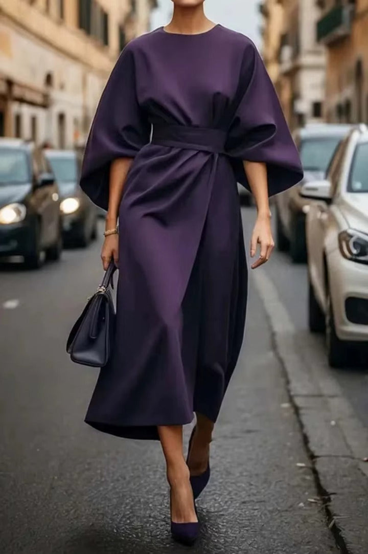 Women's elegant crew neck midi dress, perfect for a confident, professional look in the office.