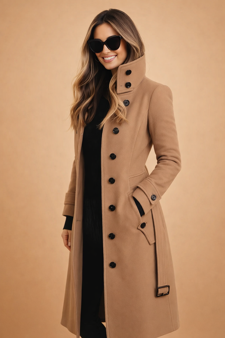 Stylish women's high-neck long winter coat. Double-breasted classic structured outerwear, ideal for fall fashion.