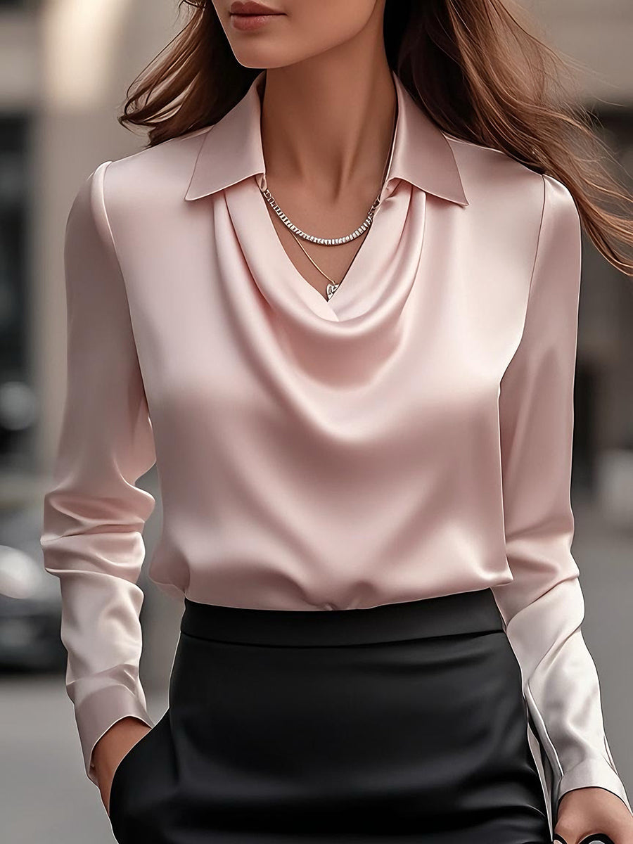 Fashionable women's blouse with graceful drape-neck and long sleeves for a polished style.