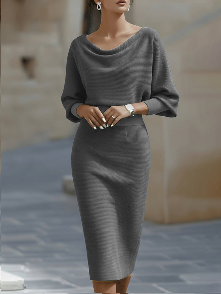 Women's elegant batwing sleeve midi dress, a chic choice for cocktail parties, evening events, or professional workwear.