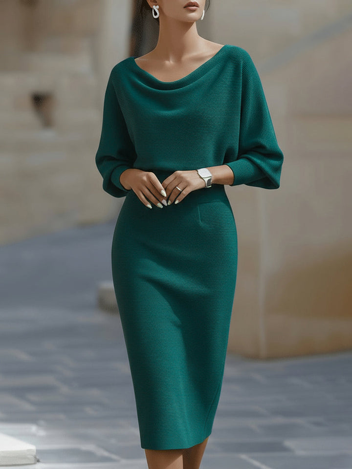 Stylish women's draped midi dress with batwing sleeves, offering timeless elegance for various occasions.