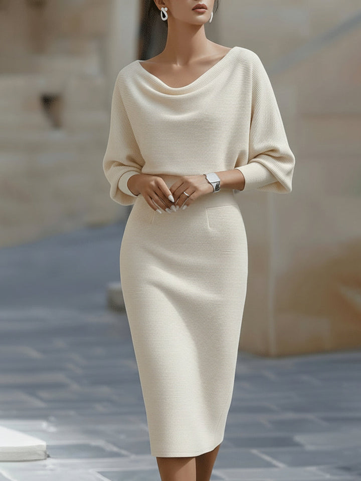 Women's elegant draped midi dress with unique batwing sleeves, ideal for sophisticated evening or work attire.