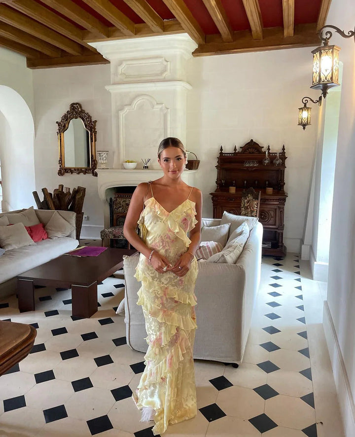 Women's ethereal ruffle maxi dress, a graceful flowing gown with romantic details. Ideal for elegant occasions.