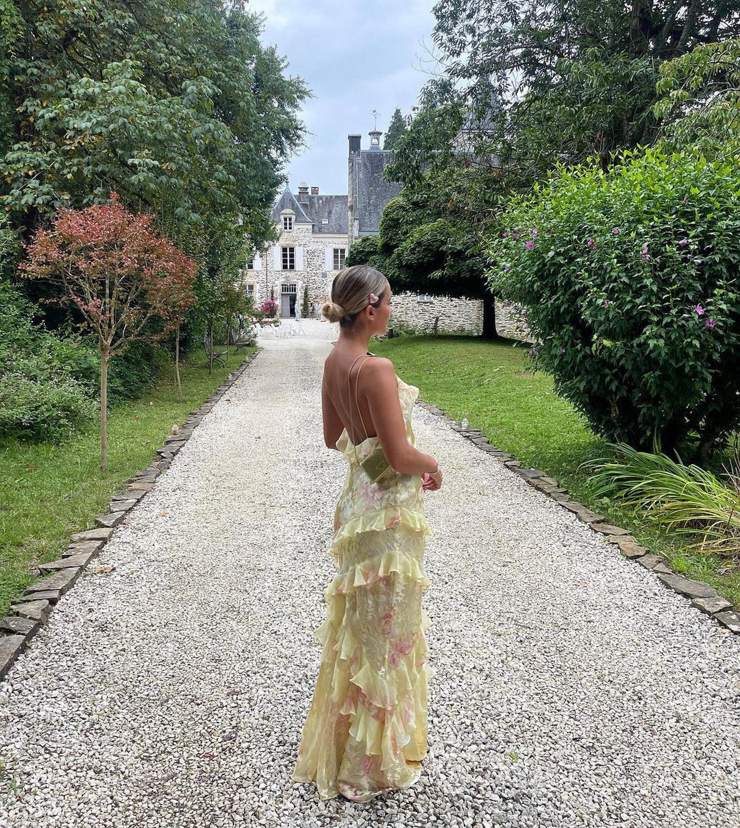 Women's romantic flowing ruffle maxi dress, an elegant gown perfect for evening parties, summer events & occasions.