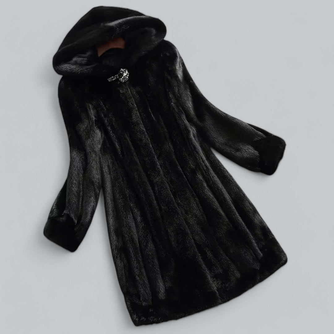 Black women's hooded faux fur long winter coat. Elegant, warm, and fashionable ethical outerwear.