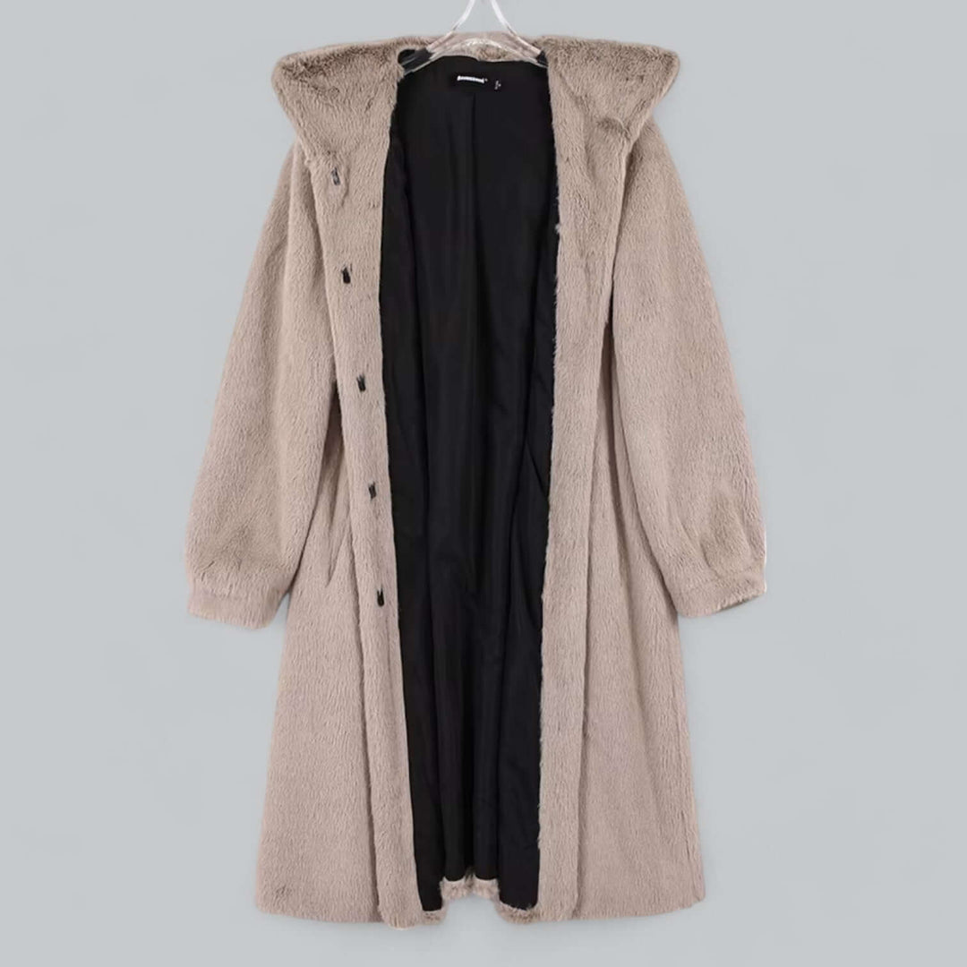 Cozy women's hooded long faux fur winter coat. Elegant, warm, and stylish outerwear for cold weather.