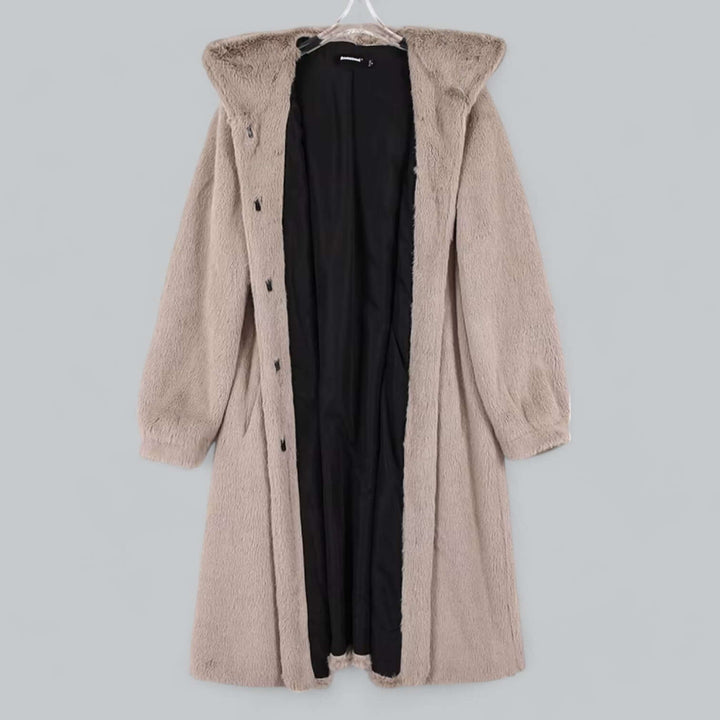 Cozy women's hooded long faux fur winter coat. Elegant, warm, and stylish outerwear for cold weather.