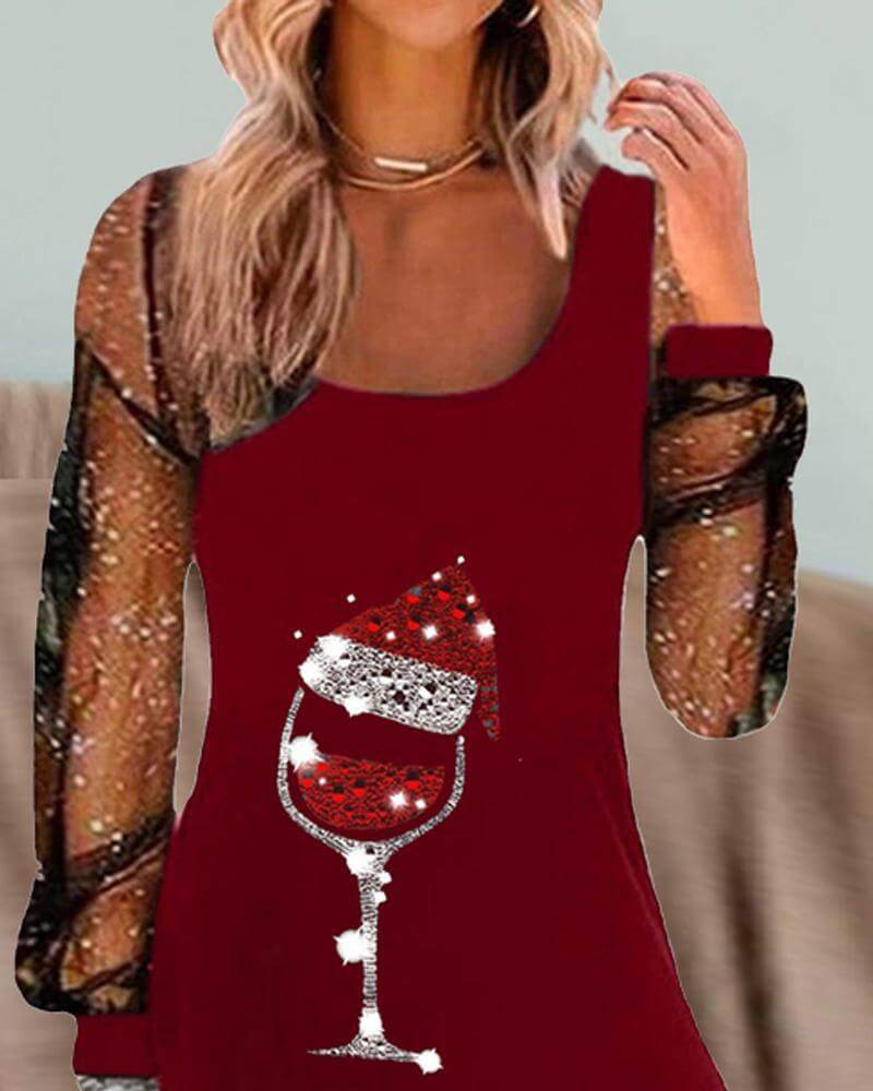 Festive women's Christmas dress with a chic wine glass pattern, great for winter holiday gatherings.