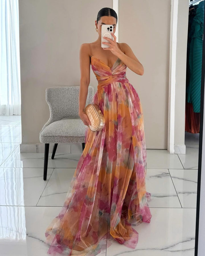 Elegant women's figure-hugging mesh maxi dress with spaghetti straps, perfect for summer evenings & parties.