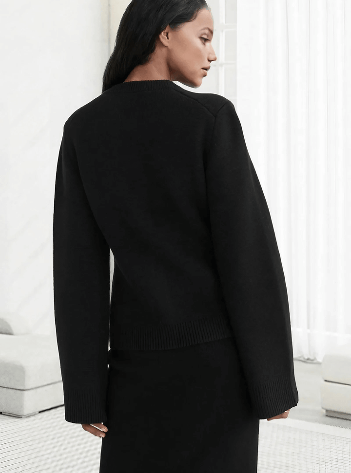 Stylish women's long sleeve flare sleeve sweater, an elegant and versatile top for various occasions.