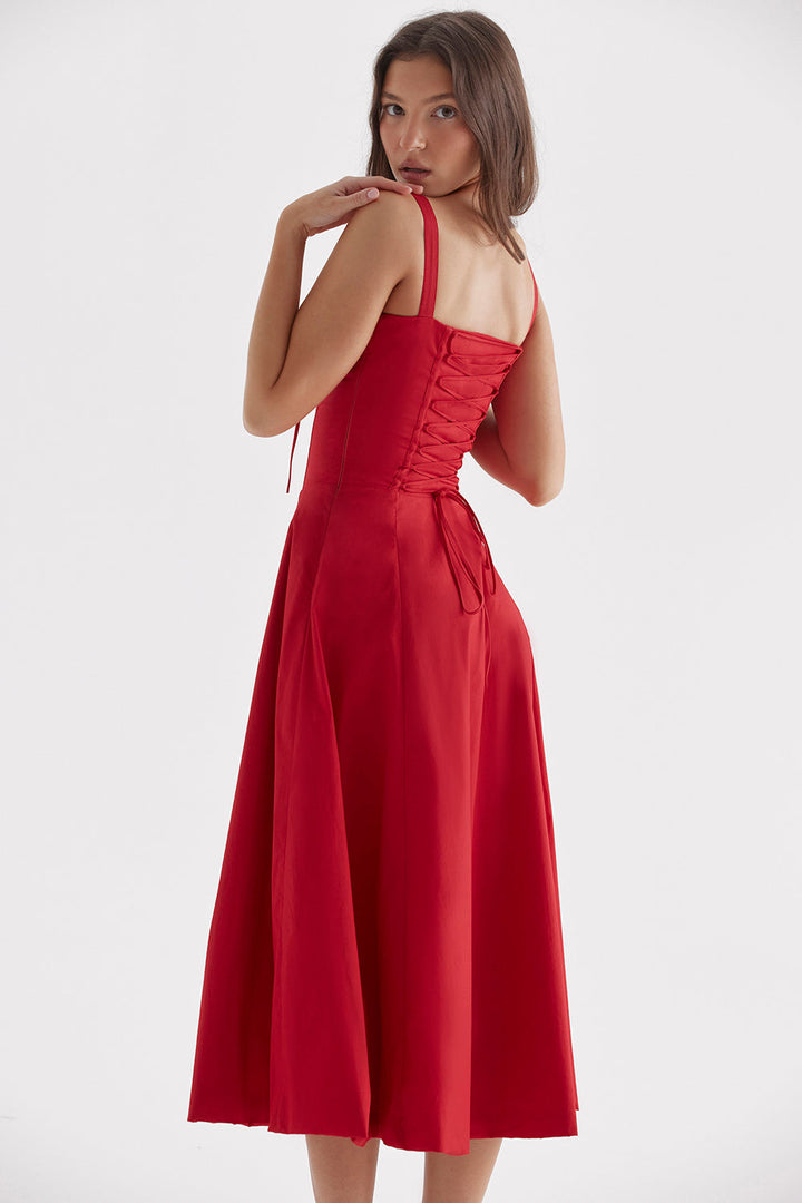 A flattering women's bustier dress with vibrant floral print, designed to shape the waist elegantly.