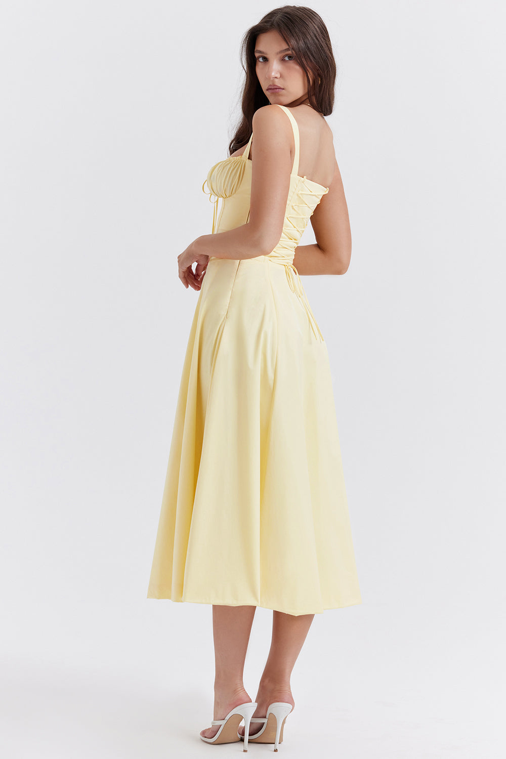 Women's chic floral midi dress, featuring an elegant bustier and effective waist shaping for a stunning look.