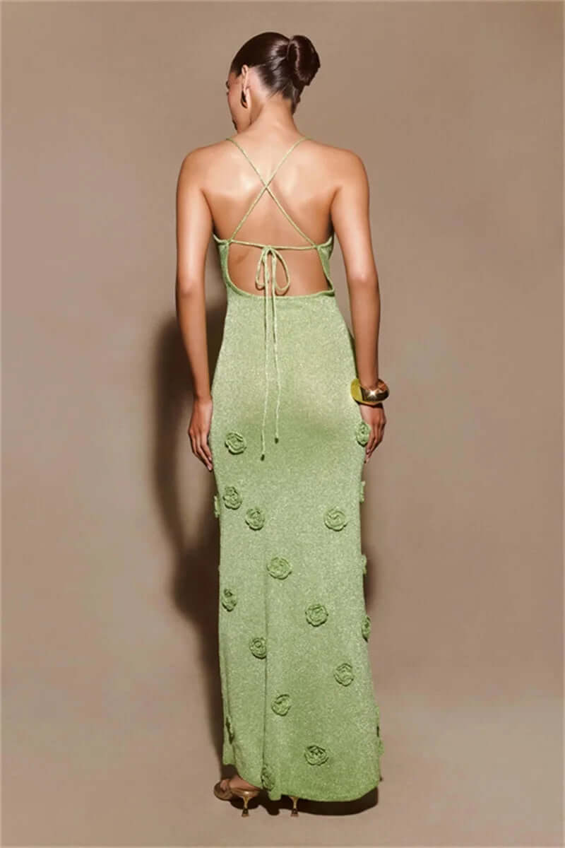 Long sleeveless V-neck formal dress with intricate floral embellishments for women. Ideal elegant party wear.