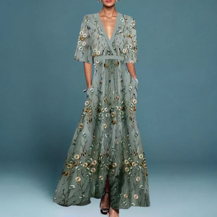 Elegant women's floral maxi dress. Flowy summer/spring fashion, perfect for casual or dressed-up occasions.