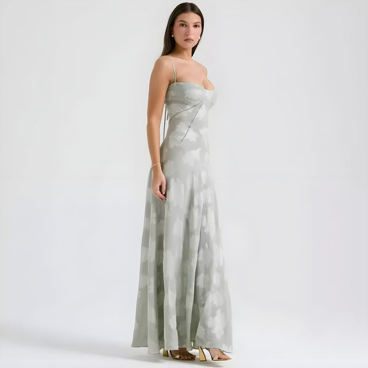 Formal A-line maxi dress for women featuring delicate floral pattern, suitable for special occasions.