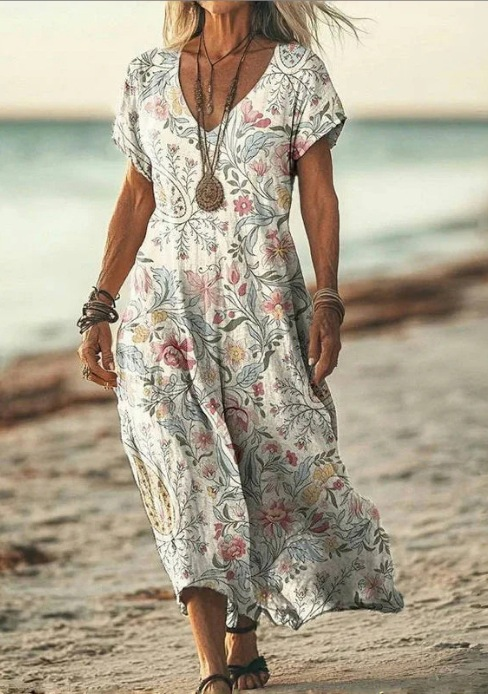 Elegant women's floral midi dress for summer and spring, perfect for casual or party wear.