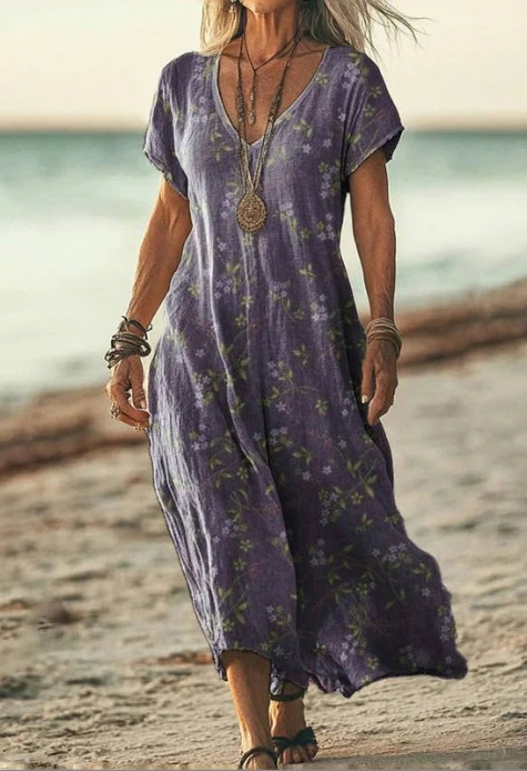 Summer ready women's floral midi dress, offering elegant style and comfort for spring.