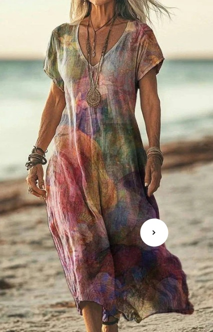 Classic women's floral midi dress, an elegant choice for spring and summer versatility.