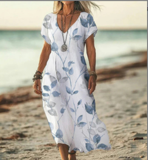 Fashionable women's floral midi dress, perfect for elegant summer parties or spring days.