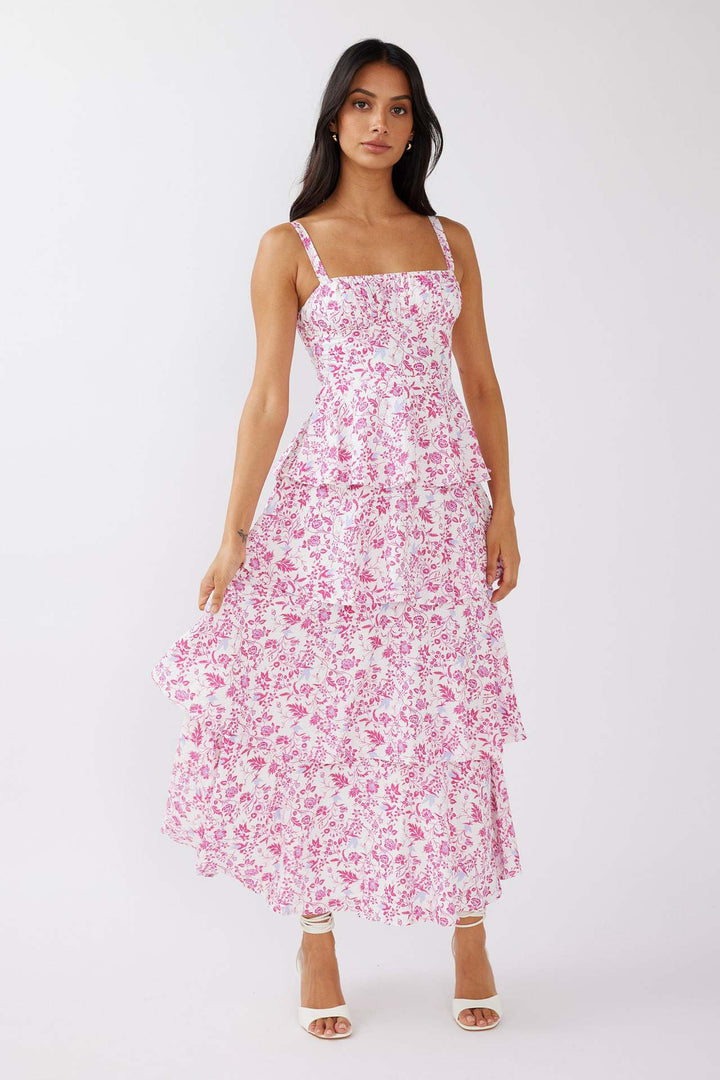 Women's elegant floral midi dress, sleeveless with a ruffled hem. Comfortable cotton blend fabric.