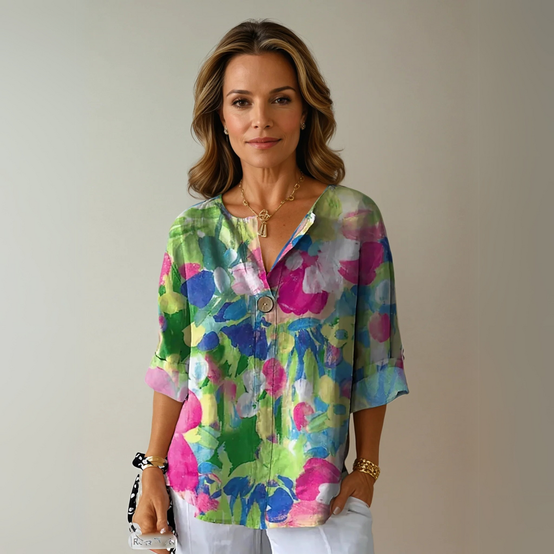 Ladies' elegant floral print blouse. A comfortable, chic long-sleeve top for stylish spring and summer outfits.