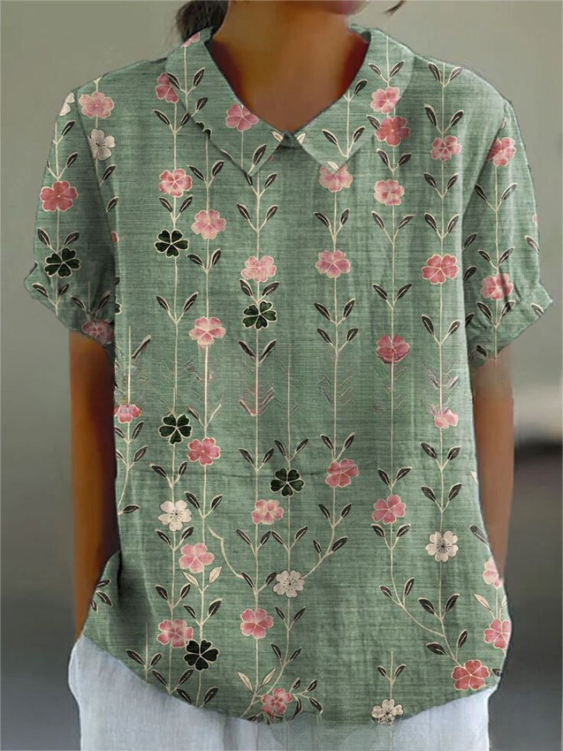Breathable women's elegant floral print shirt with a charming Peter Pan collar, great for daytime fashion.