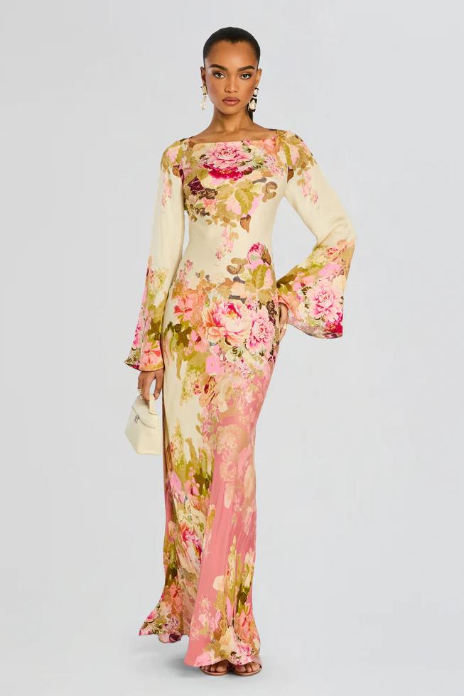 Flowing floral maxi dress for women featuring chic bell sleeves, ideal for elegant summer style.