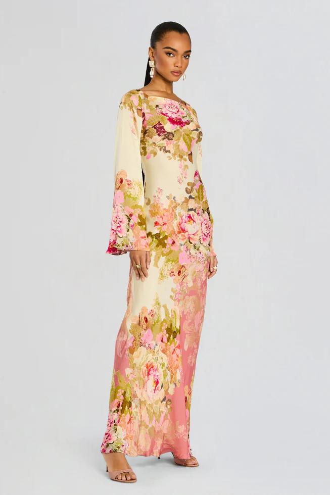 Beautiful floral print maxi dress with unique bell sleeves, offering an elegant and fashionable look for women.