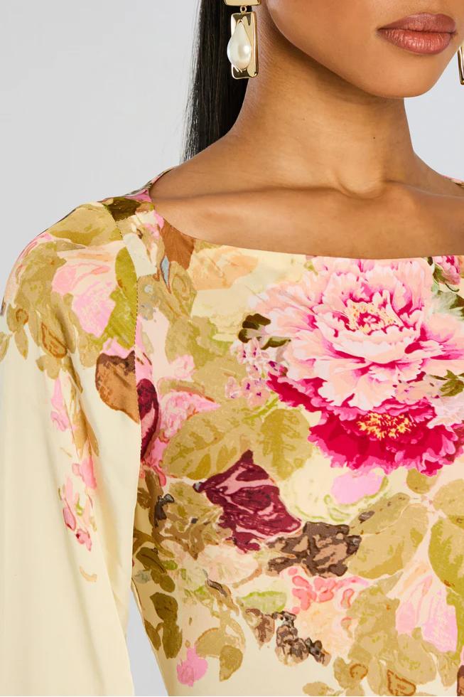 Stunning floral print maxi evening gown with elegant bell sleeves, a perfect women's dress for formal events.