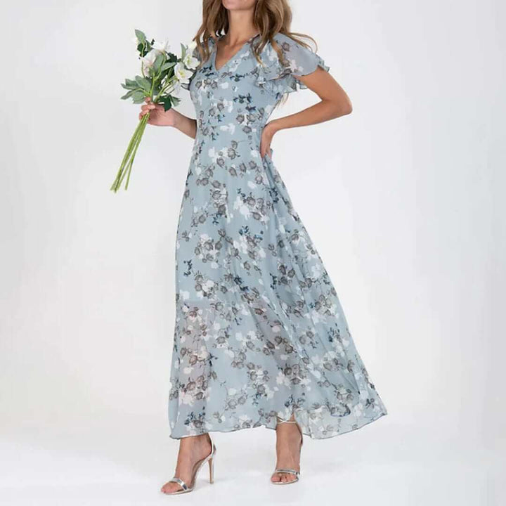 Elegant women's floral print maxi dress with V-neck, perfect for summer style. Comfortable long dress.