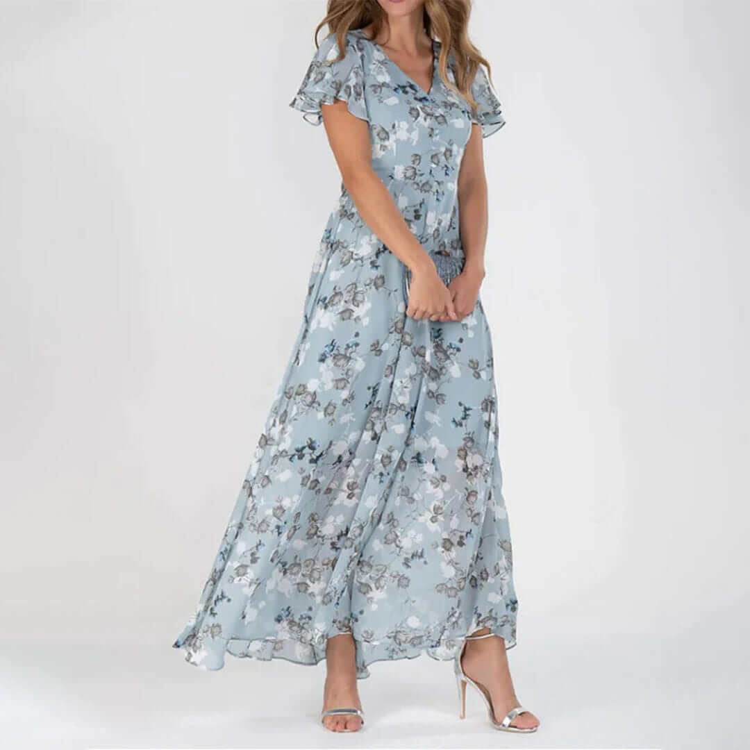 Stylish floral print maxi dress for women, featuring a comfortable polyester fabric. Ideal for casual summer wear.
