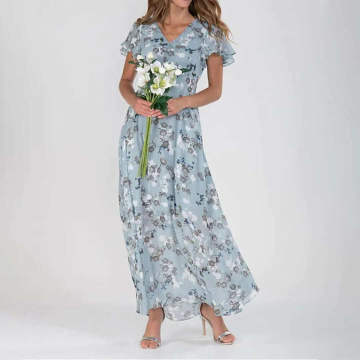 Comfortable long floral print maxi dress for women. Elegant V-neck design, great for summer casual or dressy style.