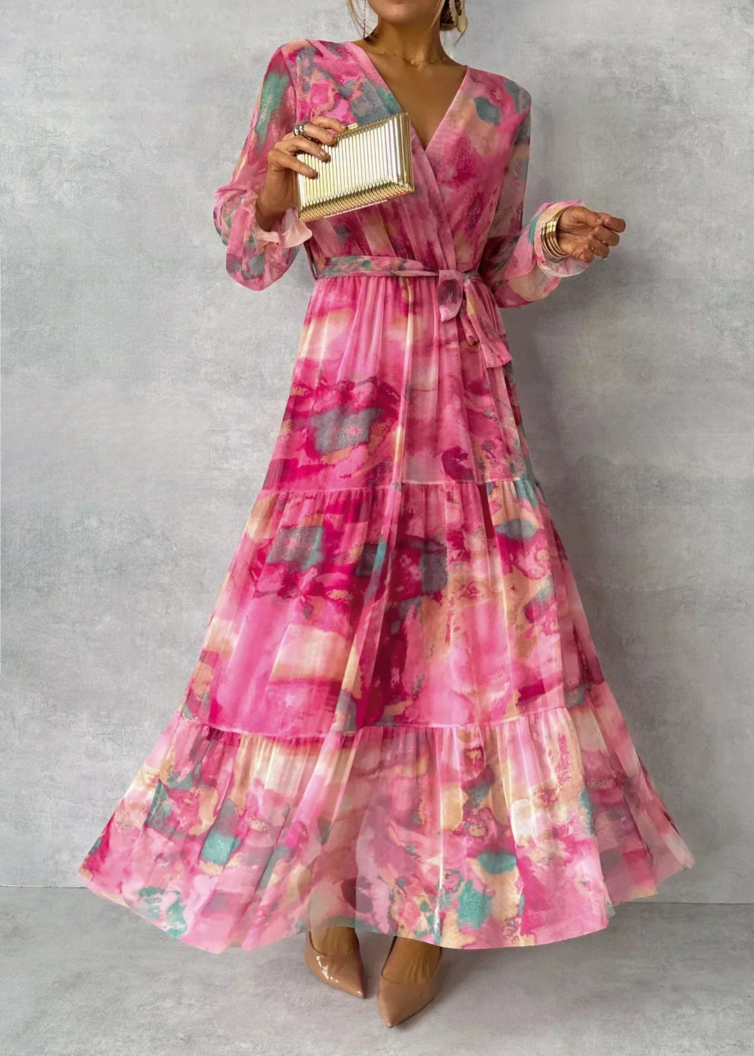 Elegant women's floral print wrap maxi dress. Long sleeve pink floral dress perfect for spring and summer events.
