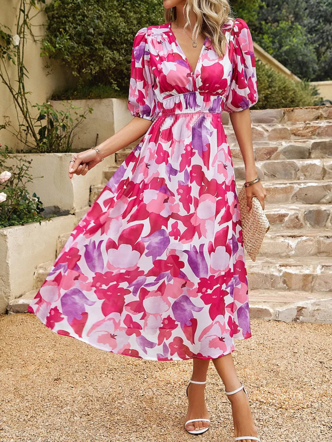 Comfortable & elegant women's floral puff sleeve v-neck midi dress, ideal for summer days.