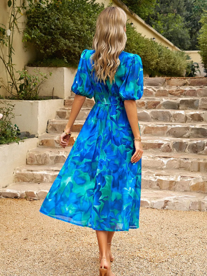 Lightweight flowy floral print puff sleeve midi dress, elegant summer style for women.