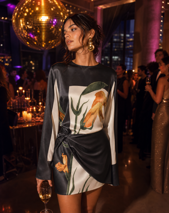 Stylish women's short floral mini dress featuring a unique twist front, perfect party or event wear.
