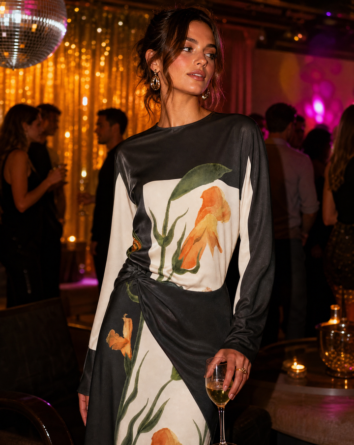 Beautiful women's elegant floral mini dress with a flattering twist design, a chic choice for any party.