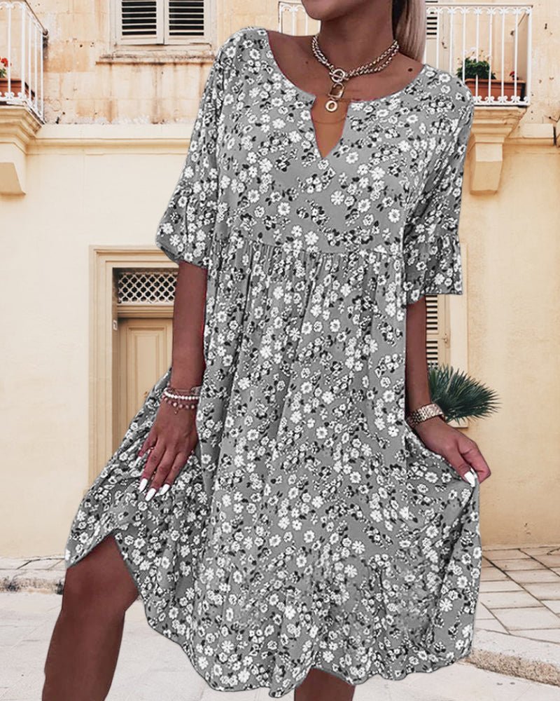 Stylish women's floral print V-neck midi dress. Ideal for spring fashion, elegant casual, or summer party outfits.