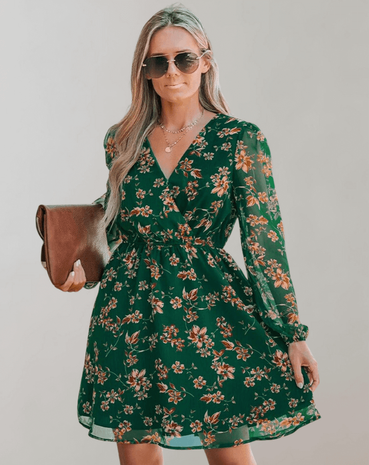Chic sleeveless floral V-neck midi dress for women, ideal for spring fashion & summer events.