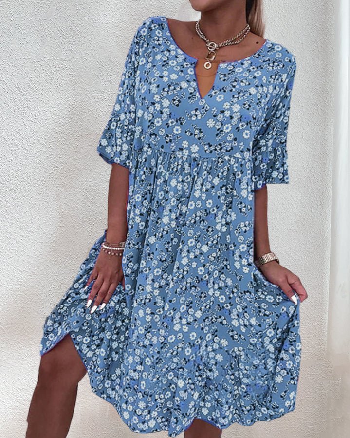 Flowy floral V-neck midi dress for women. Features elegant design, perfect for spring/summer casual & party wear. Pink, grey, blue.
