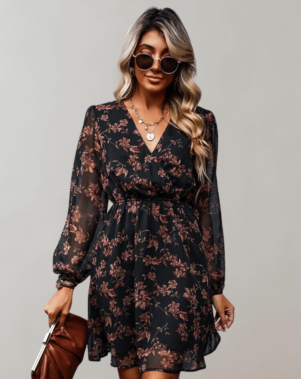 Sleeveless V-neck floral midi dress for women, featuring an elegant spring summer pattern.