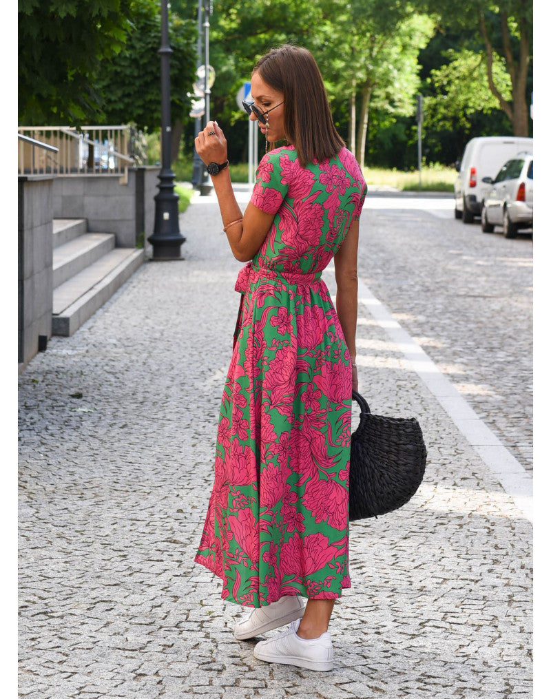 Close-up of women's floral V-neck midi wrap dress, showcasing the print & flattering waist tie detail.