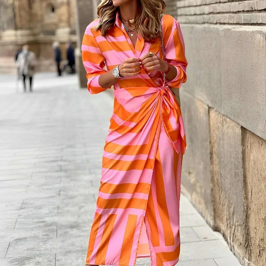 Elegant women's floral wrap midi dress. Flattering design, perfect for versatile summer casual or dressy wear.