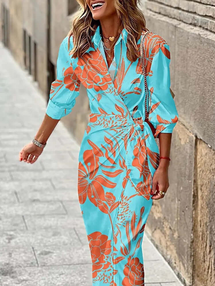 Women's elegant floral wrap midi dress. Comfortable and versatile, perfect for summer casual or semi-formal looks.