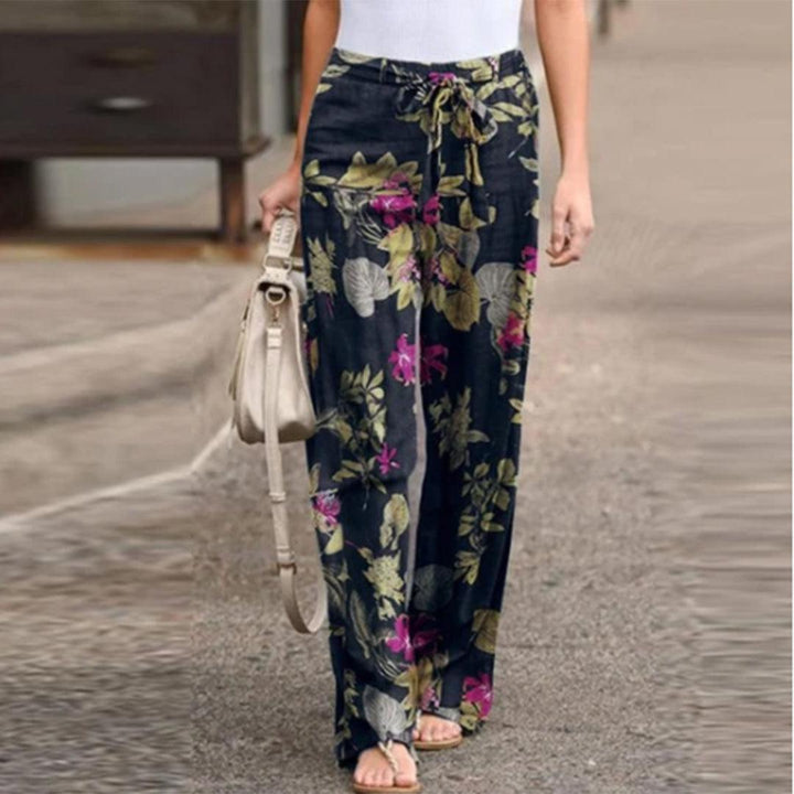 Flowy women's flowerprint pants with an elegant bow, a stylish choice for summer casual and comfortable wear.