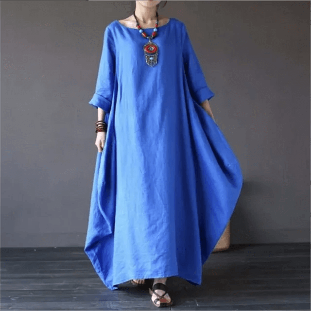 Casual women's flowy maxi dress in a breathable cotton blend, ideal for summer days & comfortable wear.