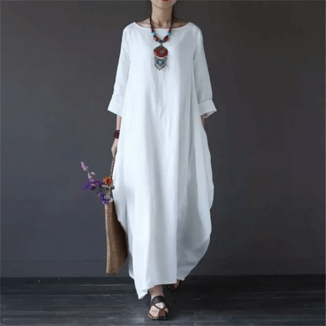 Versatile women's flowy maxi dress: transitions from elegant evening wear to comfortable summer casual style.