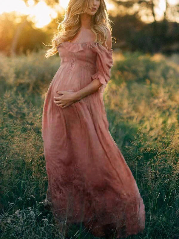 Comfortable flowy off-shoulder maxi maternity dress for women, ideal for elegant pregnancy fashion & summer style.
